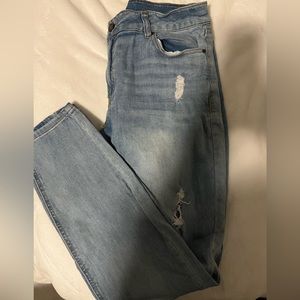 Light denim distressed skinny jeans